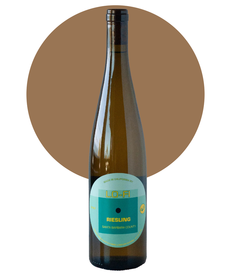 Bottle of Lo-Fi Dry Riesling on a white background with a tan circle